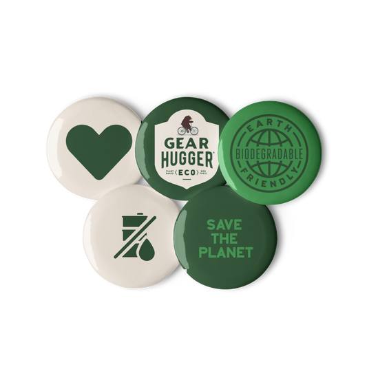 Five green and white coloured pins with words like save the planet and gear hugger.