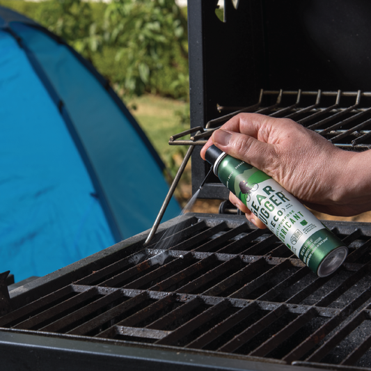 applying lubricant to BBQ grill