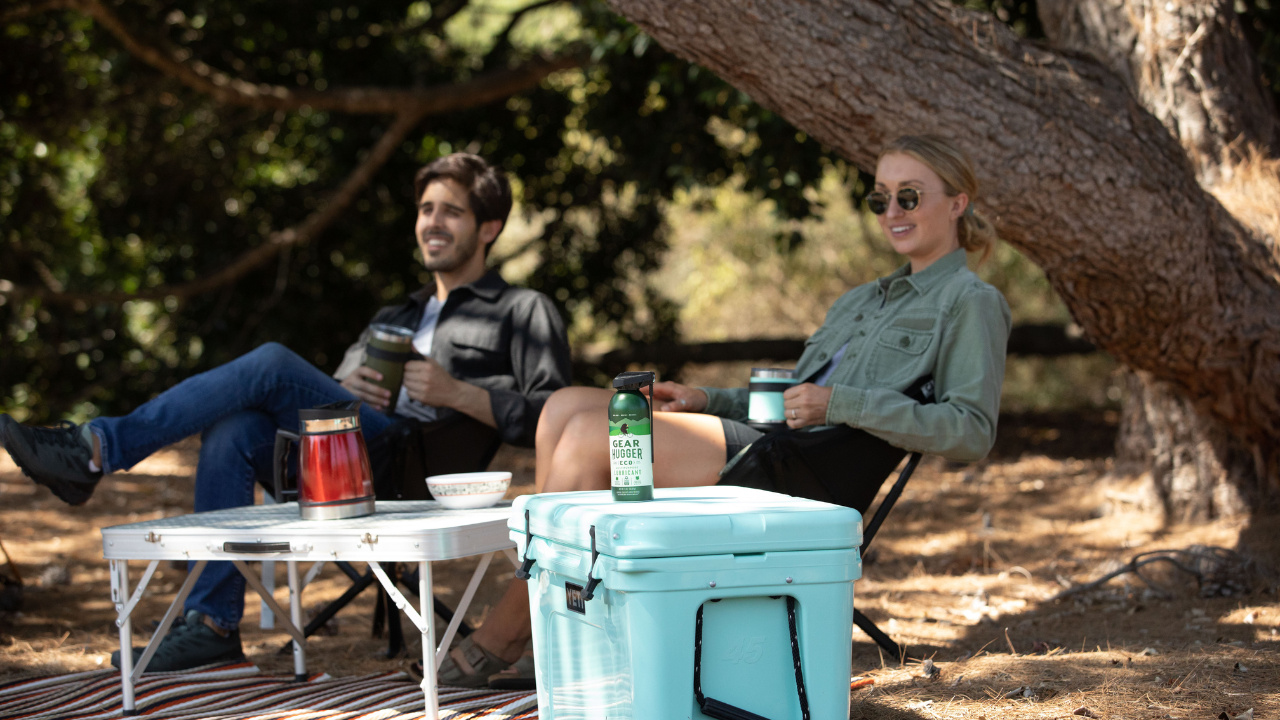 Couple relaxing outdoors choosing eco-friendly alternatives to toxic outdoor products