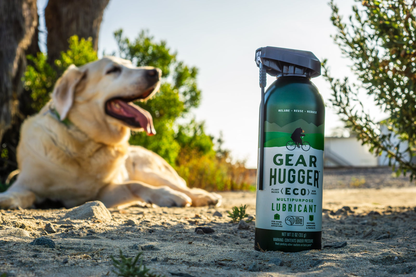 Dog outdoors next to Gear Hugger pet-safe eco-friendly heavy duty degreaser spray