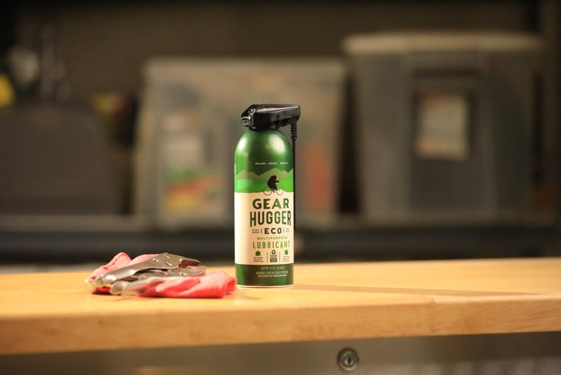 Gear Hugger plant-based eco-friendly lubricant spray in a garage - better than petroleum