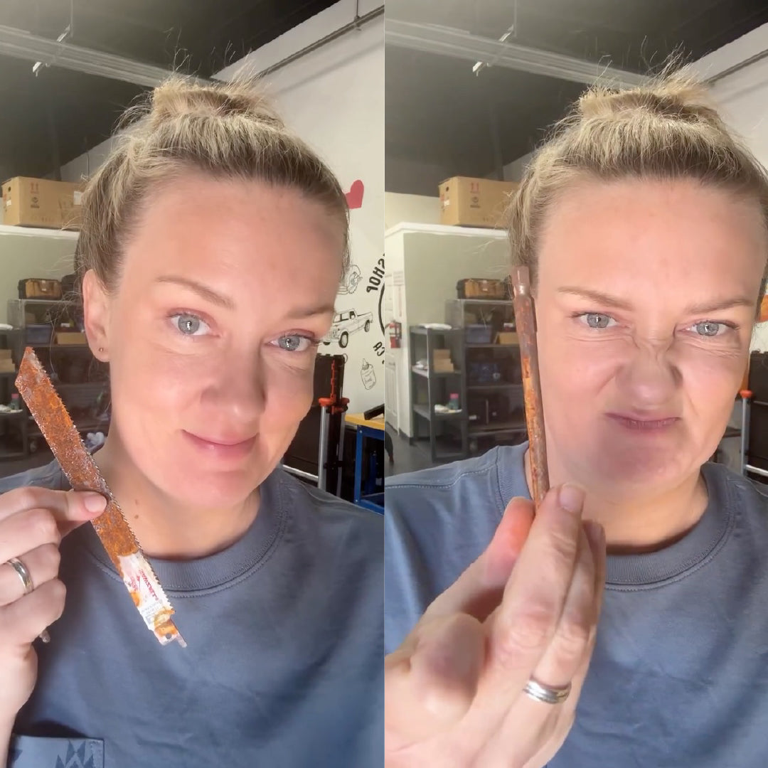 Woman holding some rust, first smiling, then making a face of disgust while looking at it.