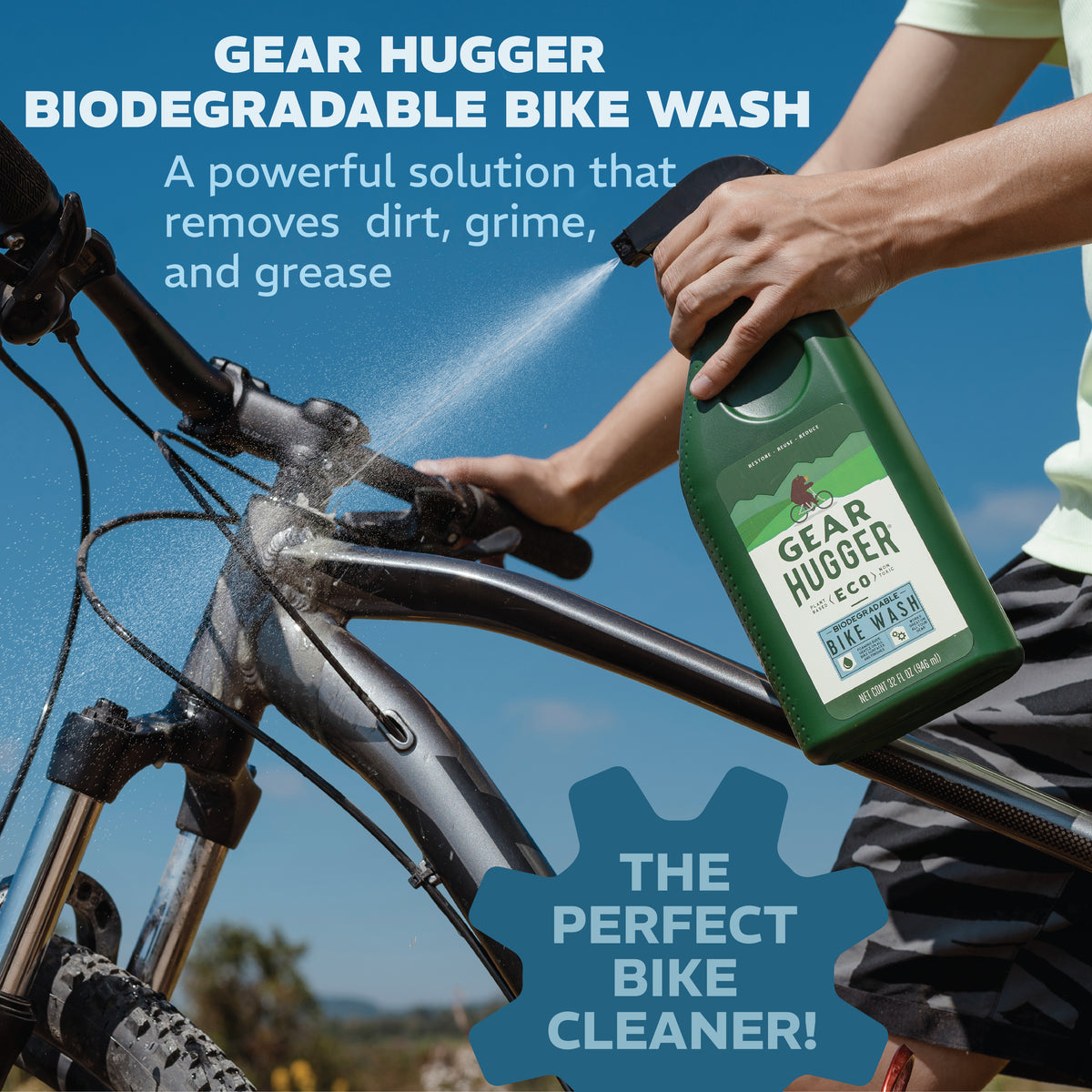 Eco biodegradable bike wash sprayed on bike frame - removes dirt, grime and grease, perfect bike cleaner