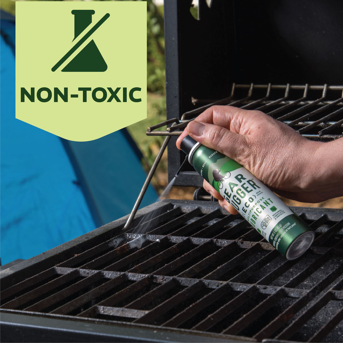 Non-toxic eco multipurpose lubricant applied to campsite grill grates - safe, plant-based formula