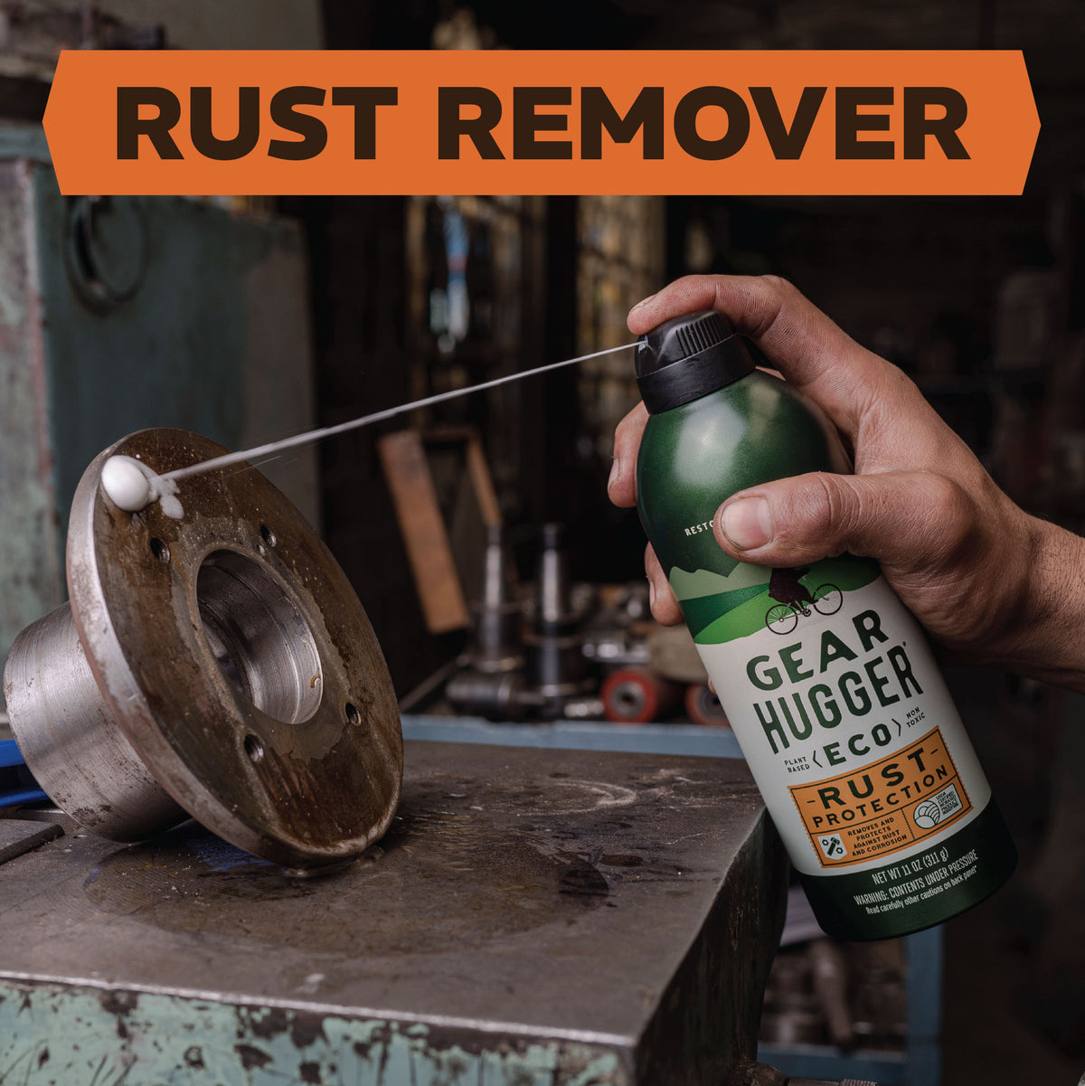 Eco rust remover spray applied to rusted metal rotor in garage - 100% biobased, plant-based formula